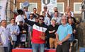 2026 IOM Worlds at Datchet Water - Alexis Carre with the trophy and other prize winners in the background &copy; Mark Jardine