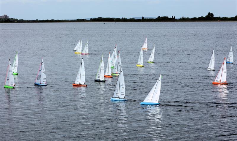 2026 IOM Worlds at Datchet Water Day 4 - The fleet in light winds upwind - photo © Mark Jardine