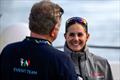 Margherita Porro talking in the media pen with Magnus Wheatley on day 1 - Louis Vuitton 38th America's Cup - Preliminary Regatta Sardinia - May 22, 2026 &copy; David Maynard / www.alleycatphotographer.com