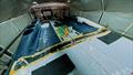 Tudor Alinghi's AC75 under reconstruction in preparation for the 2027 America's Cup. August 2026 &copy; America's Cup Media