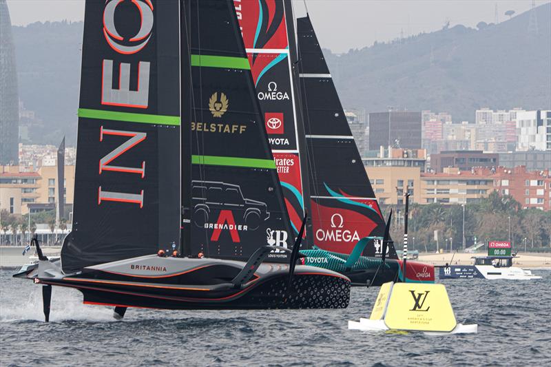 The Challenger and Defender cross the startline on Day 3 of the 2024 America's Cup - October 14, 2024 - Barcelona photo copyright Ian Roman / America's Cup taken at Real Club Nautico de Barcelona and featuring the AC75 class