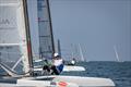 The 79 year old sailing Hall Of Fame legend Ben Hall, USA still in the saddle and loving the Classic A-Cat - A-Class Cat European Championships at Riccione Day 5 © Gordon Upton / www.guppypix.com