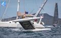 © Gordon Upton / www.guppypix.com Kuba Surowiec accedentally capsizes at the line as triple World Champion .- Day 5 Predictwind A-Class Catamaran World Championships - Milford, NZ - November 16, 2025 © Gordon Upton / www.guppypix.com