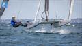 © Gordon Upton / www.guppypix.com Ravi Parent comes into the finish to get the bullet in the second race of the day .- Day 5 Predictwind A-Class Catamaran World Championships - Milford, NZ - November 16, 2025 © Gordon Upton / www.guppypix.com