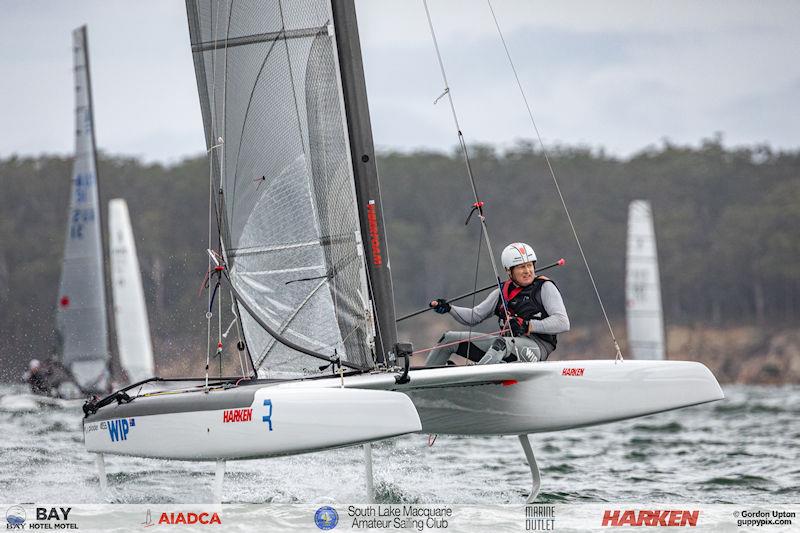 Australian A-Cat Nationals on Lake Macquarie Day 2 - Stevie Brewin heading for the bottom gate photo copyright Gordon Upton / www.guppypix.com taken at South Lake Macquarie Amateur Sailing Club and featuring the A Class Catamaran class