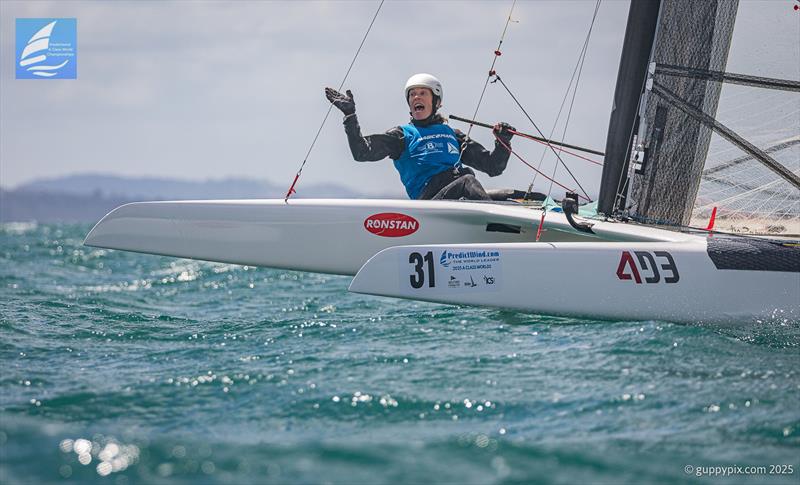 PredictWind A-Class Cat Worlds 2025 Day 4 - Carolijn Brouwer delighted to have finished an epic day of racing, and remain on the boat, unlike her husband Bundy - photo © Gordon Upton / www.guppypix.com