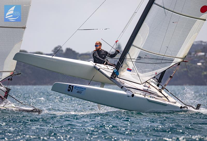 Swiss Champion Robin Maeder getting loose at the bottom mark on his Classic Scheuer - Day 5 Predictwind A-Class Catamaran World Championships - Milford, NZ - November 15, 2025 - photo © Gordon Upton / www.guppypix.com