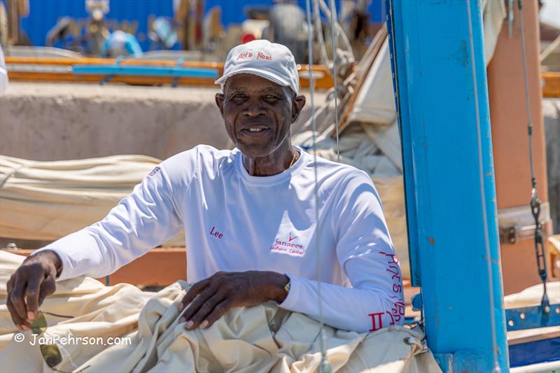79-year-old Lee Armbrister, skipper of Class-B sloop Ants Nest photo copyright Jan Pehrson taken at  and featuring the Bahamian Sloop class