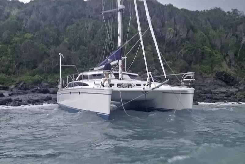 Having dragged her anchor, this cat tore into herself on this rocky lee shore photo copyright Pantaenius taken at  and featuring the Catamaran class