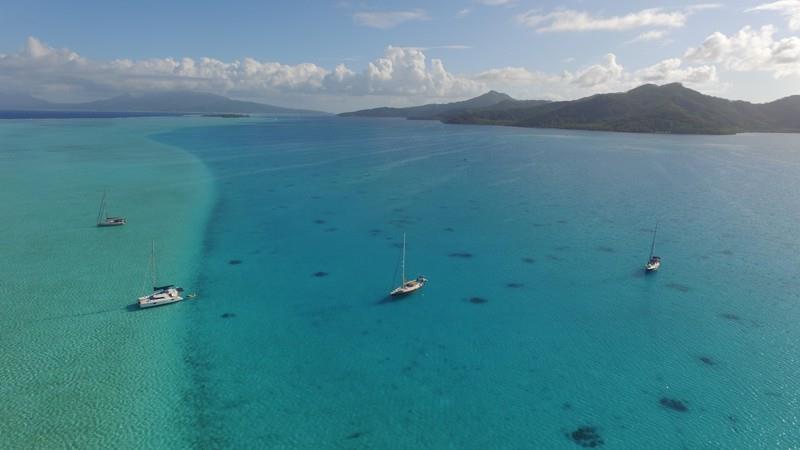 Left to right - SV Tourterelle, SV Two Drifters, SV Supertramp, SV Ocean Blue anchored off Ta'aha - photo © Jenevora Swann