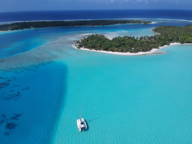 Two Drifters anchored in Maupiti photo copyright Jenevora Swann taken at  and featuring the Catamaran class