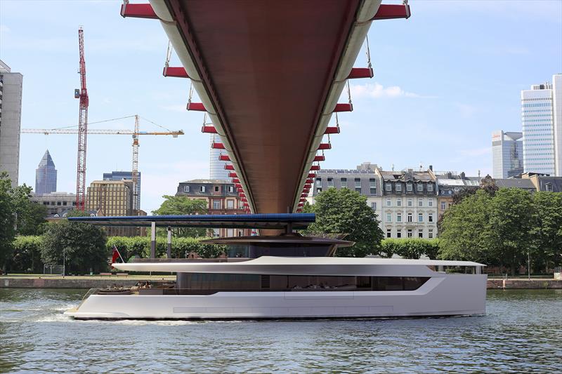 Dragonfly demonstrating her versatility and practicality by reducing her air draft - photo © Dixon Yacht Design