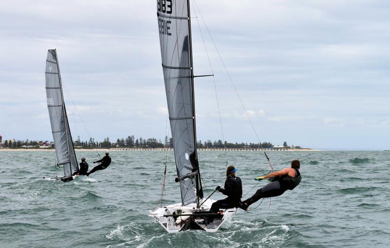 60th Cherub Australian National Championship - Zac Heyes & Peter McLeod (third overall, nearest camera) and Nicole Barnes & Brett Lancaster (second overall) photo copyright Keisha Day taken at Largs Bay Sailing Club and featuring the Cherub class
