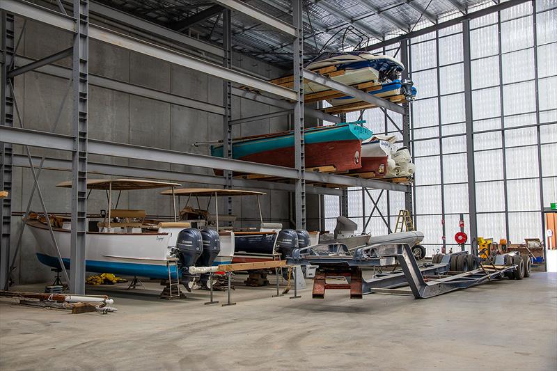 Inside the cavernous and configurable dry stacker - note the two Kooyongs at ground level and the opaque Northern wall for light.. photo copyright John Curnow taken at Sorrento Sailing Couta Boat Club and featuring the Classic Yachts class