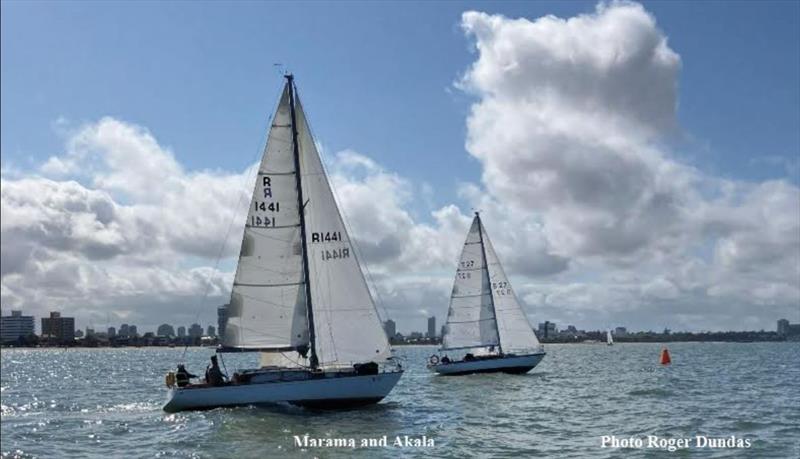 Marama and Akala cross the race two finish line photo copyright Roger Dundas taken at Royal Yacht Club of Victoria and featuring the Classic Yachts class