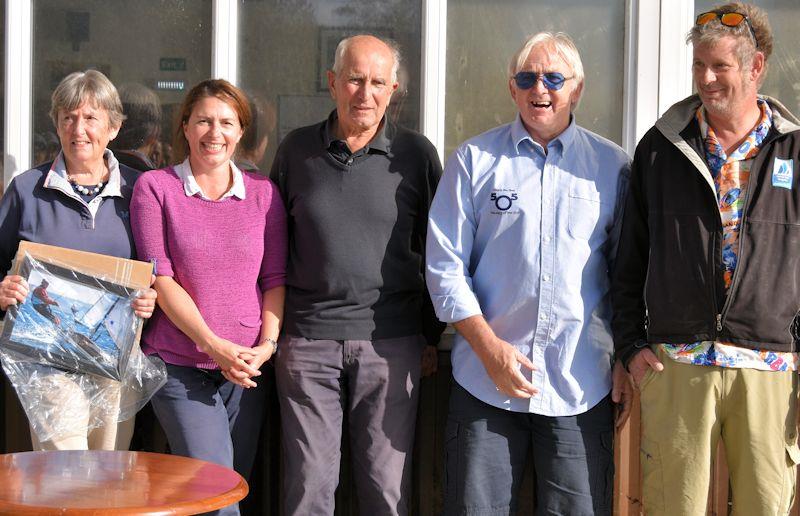 Keith Paul retires from competitive sailing (on the left, his wife and daughter, and on the right, Dougal Henshall and Chris Boshier from the BCA) photo copyright Lin Henshall taken at Weston Sailing Club and featuring the Contender class