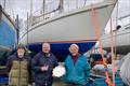 Unable to attend the Solway YC prize-giving, a special presentation was made by the Sailing Secretary John Broadbent, and Cruising Secretary Neil Munro, to Peter Warner (centre) for the Best Kept Yacht in front of Sonas of Craignish