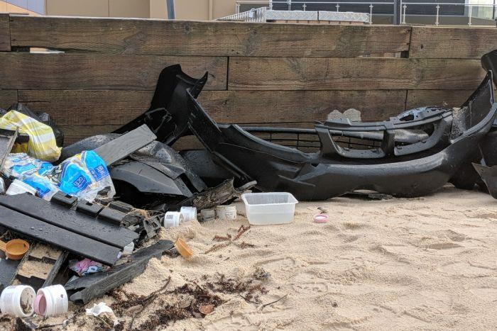 Debris from Liberian ship YM Efficiency washed up north of Newcastle. The ship lost part of its cargo during stormy weather last week. - photo © ABC News: Nancy