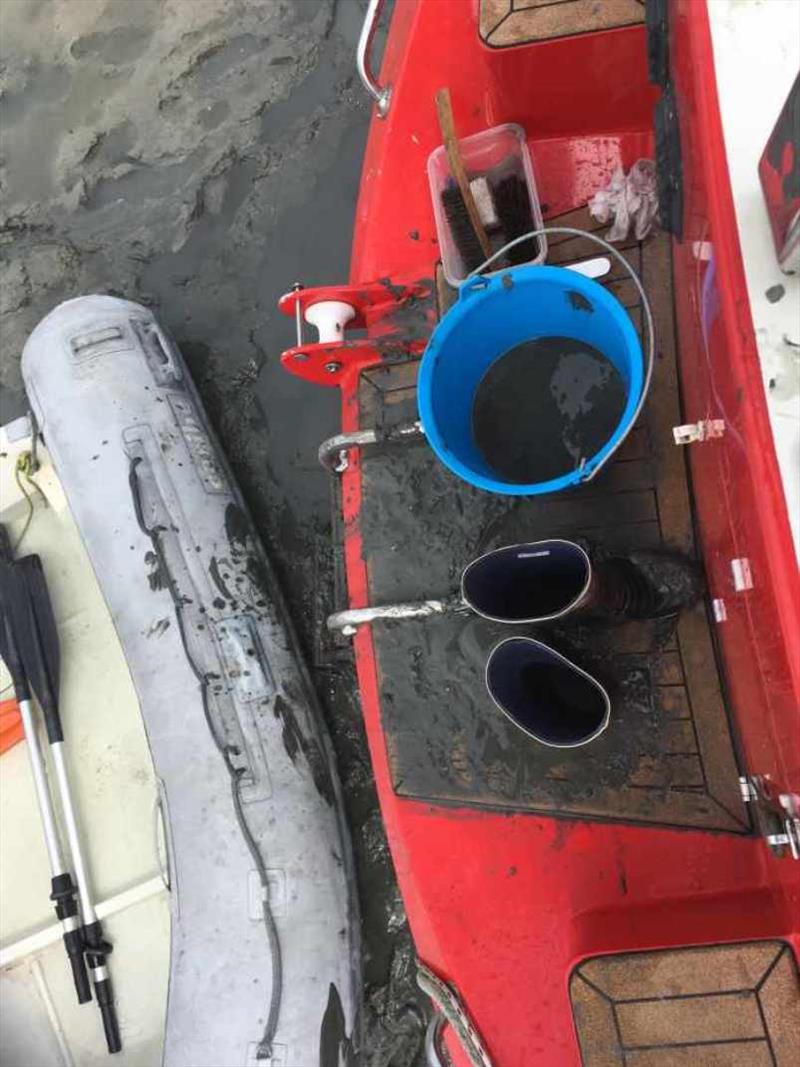 Muddy job, mud was contained to the swim deck keeping the topside of the boat clean - photo © SV Red Roo