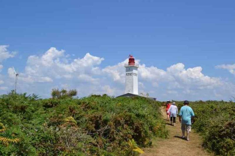 Visting the lighthouse photo copyright SV Red Roo taken at  and featuring the Cruising Yacht class