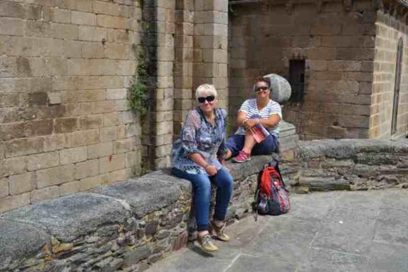 Kris and Maree in Betanzos outside one of the many churches photo copyright SV Red Roo taken at  and featuring the Cruising Yacht class