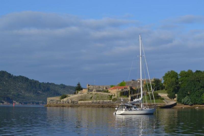 Aussie boat Taipan anchored in Ria de Ferrol below San Filepe Fortress - photo © SV Red Roo