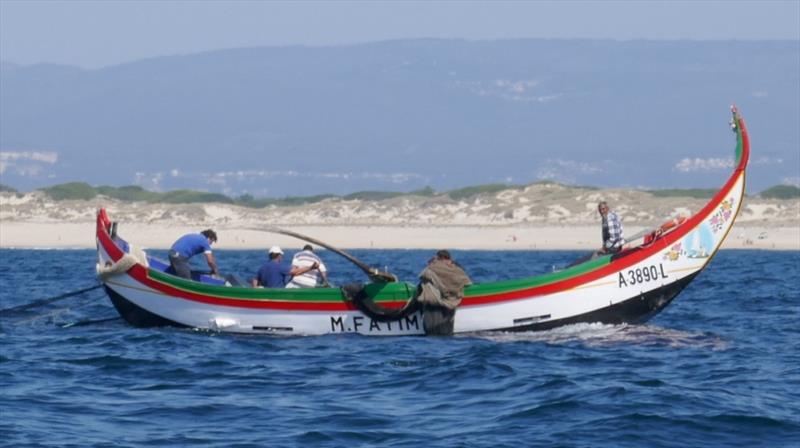 There is big surf and tractors on the beach photo copyright SV Taipan taken at  and featuring the Cruising Yacht class