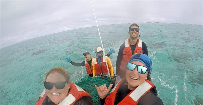 The `Furious Five` with a load of debris and derelict fishing nets aboard our small boat - photo © NOAA Fisheries