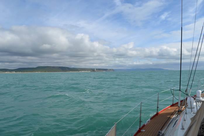 Approaching Cape Trafalgar, notice the lovely green water photo copyright SV Red Roo taken at  and featuring the Cruising Yacht class