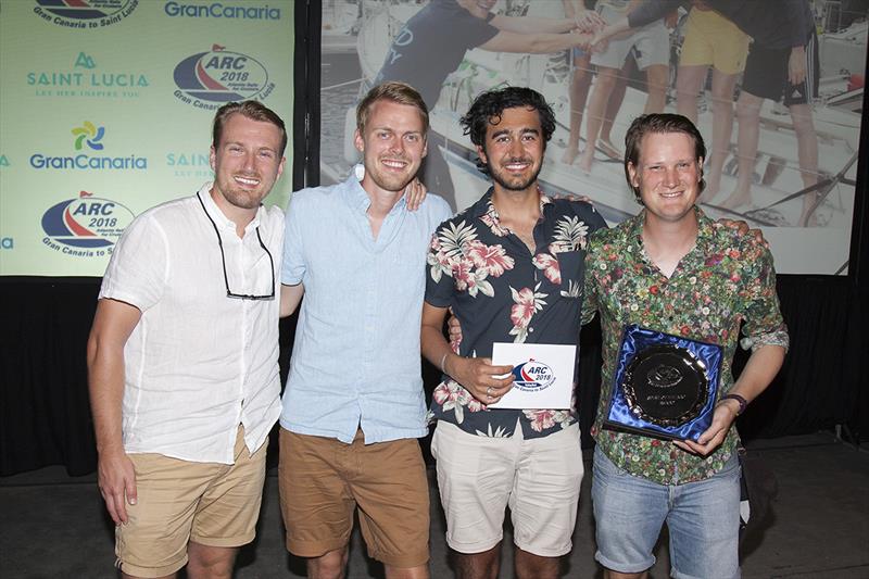 2018 ARC - Prize-giving - The crew of Seren, awarded the Spirit of the ARC for standing by a stricken non-ARC yacht for 11 days and assisting them in to Saint Lucia photo copyright Clare Pengelly taken at  and featuring the Cruising Yacht class