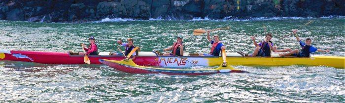 Local outrigger canoe club practicing in Atuona. - photo © Henk and Lisa Benckhuysen