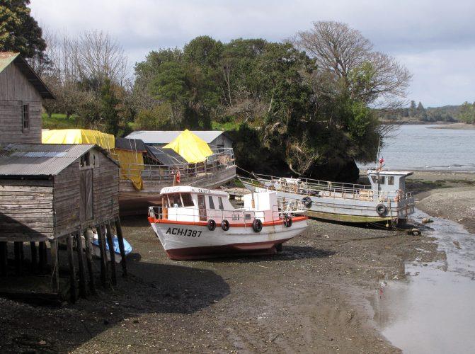 Dried inlet with grounded fishboats. - photo © Laurence Roberts and Mary Anne Unrau