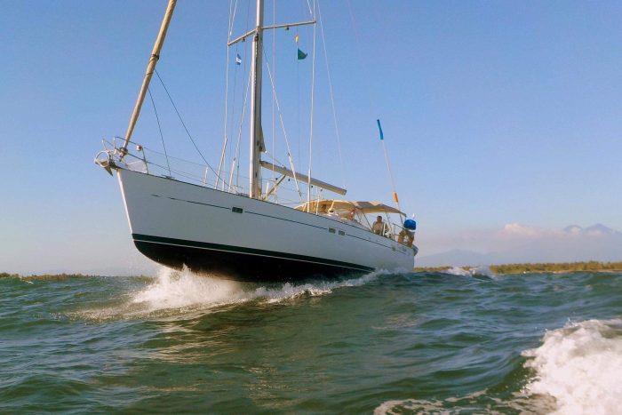 Crossing the bar in El Salvador photo copyright Dennis Giraud taken at  and featuring the Cruising Yacht class