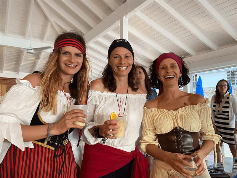 Olivia, Myself, and Danielle enjoying our cocktails at the Pirate's Night Kickoff Party photo copyright Catherine Guiader taken at  and featuring the Cruising Yacht class