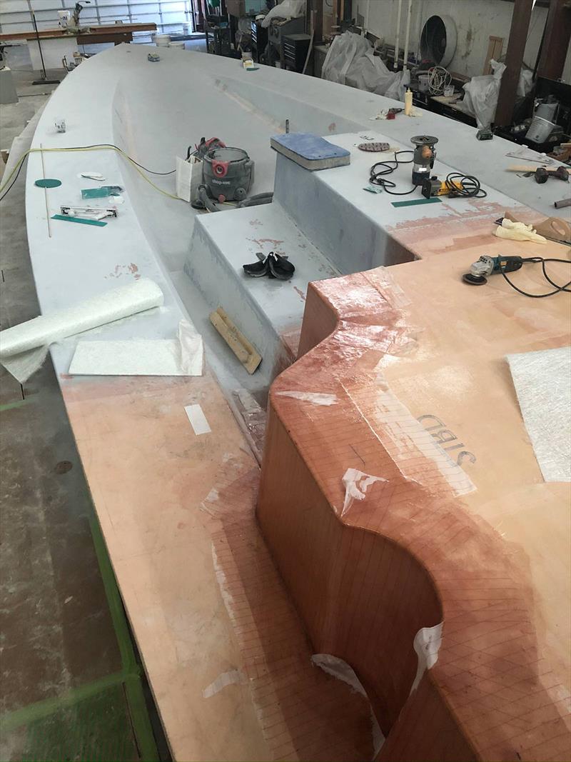 The underside of the deck form reveals the complex contours and shapes that will be part of the LM46 deck.  - photo © Lyman-Morse Boatbuilding