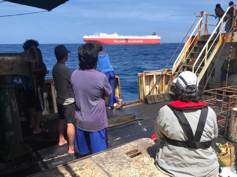 Crew of Chinese longliner watching the arrival of the Tonsberg photo copyright Peter Nielsen taken at Ocean Cruising Club and featuring the Cruising Yacht class