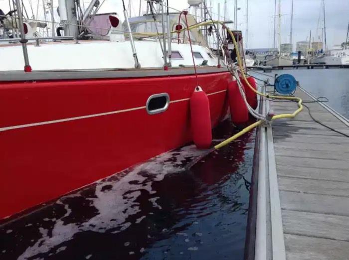 Pumping the water out of Red Roo photo copyright Sailing Vessel Red Roo taken at  and featuring the Cruising Yacht class