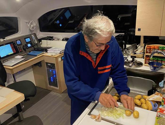 Jimmy Cornell cooking photo copyright Jimmy Cornell taken at  and featuring the Cruising Yacht class
