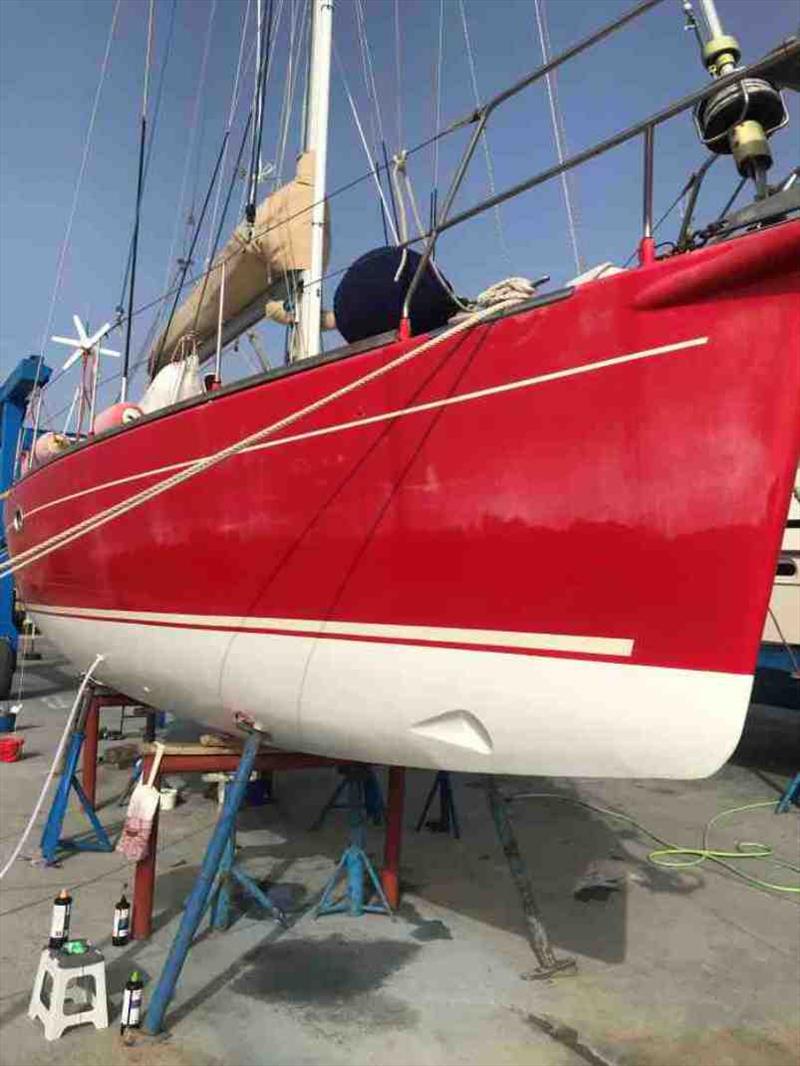New white anti-foul on (too busy painting to get picture of that going on). Then back, arm, soul breaking job of polishing for Maree begins, starting with what I could reach from ground (seen above) before I spent a day on broken scaffold over extending photo copyright Red Roo taken at  and featuring the Cruising Yacht class