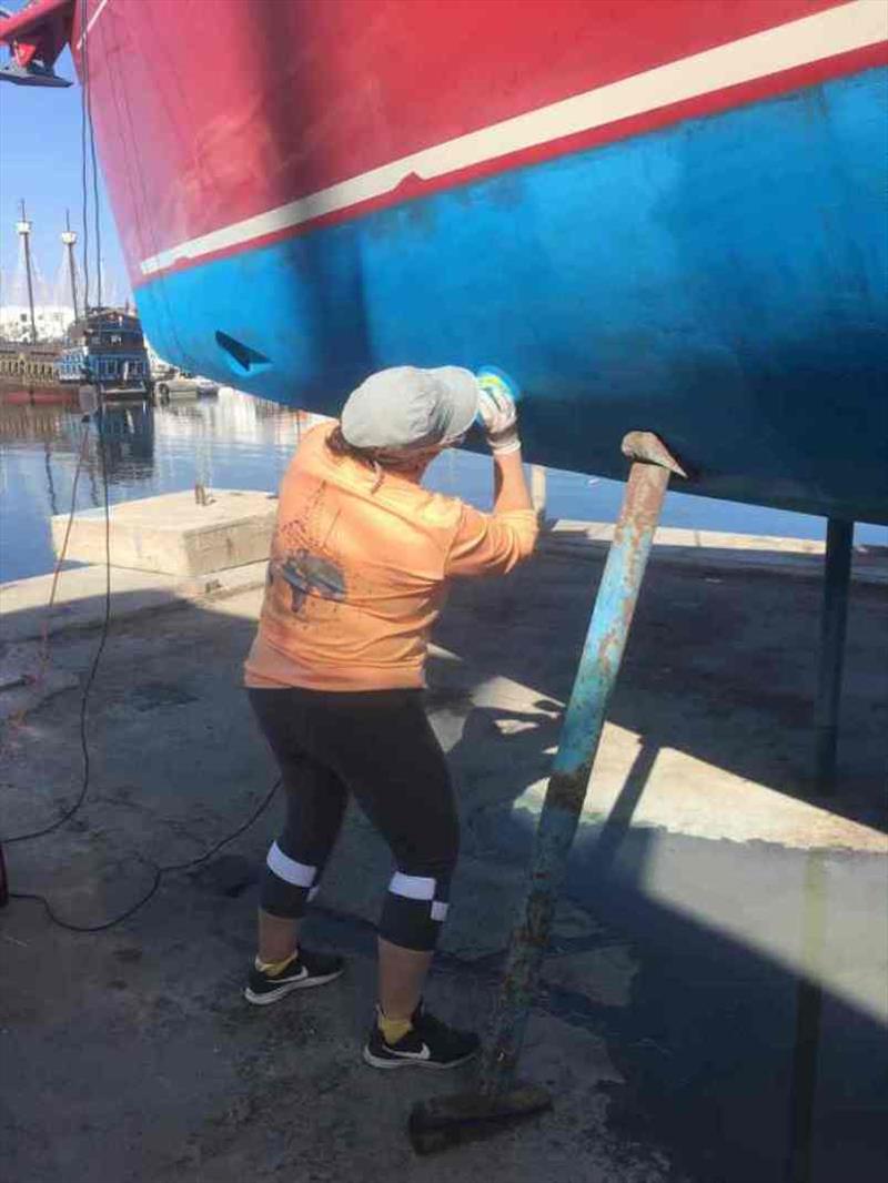 Sanding 1.5 full days of it for Maree, by hand and machine photo copyright Red Roo taken at  and featuring the Cruising Yacht class