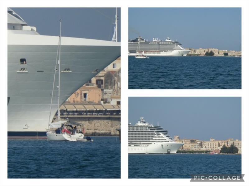 A Cruise Ship in Syracuse look how it dwarfs the buildings and yachts - photo © SV Red Roo