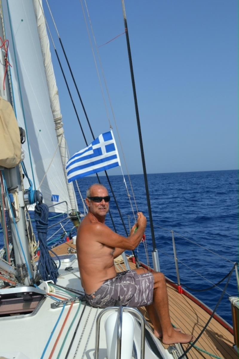 Raising the Greek Flag - photo © SV Red Roo