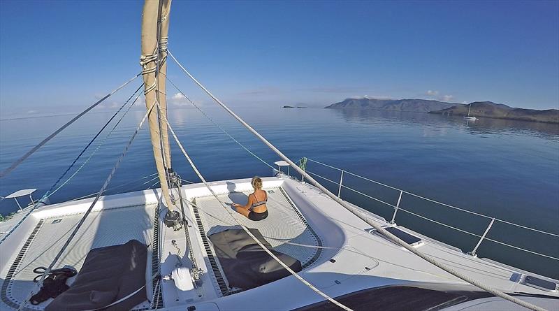 Morning Yoga on the bow in New Caledonia - My personal practice photo copyright Leanne Hembrow taken at  and featuring the Cruising Yacht class