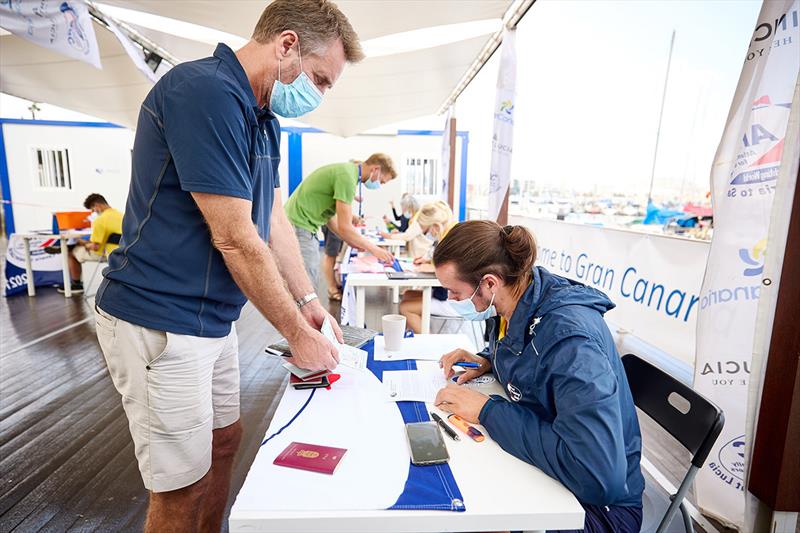 2021 ARC - Checking out from Las Palmas de Gran Canaria with passports of every crew on board - photo © James Mitchell