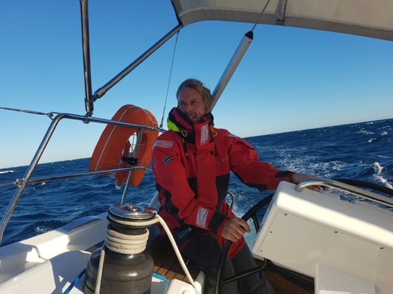 Jeff Hanlon at helm photo copyright Jeff Hanlon taken at  and featuring the Cruising Yacht class