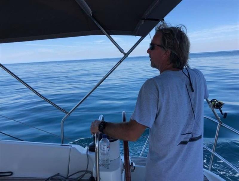 Jeff Hanlon at helm photo copyright Jeff Hanlon taken at  and featuring the Cruising Yacht class