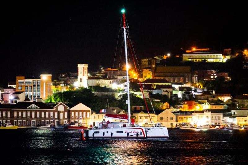 Passing the lively waterfront of Carenage photo copyright WCC / Arthur Daniel taken at  and featuring the Cruising Yacht class