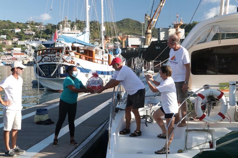 Chinel Sandy, GTA representative, gave them a welcome basket - photo © Viking Explorers