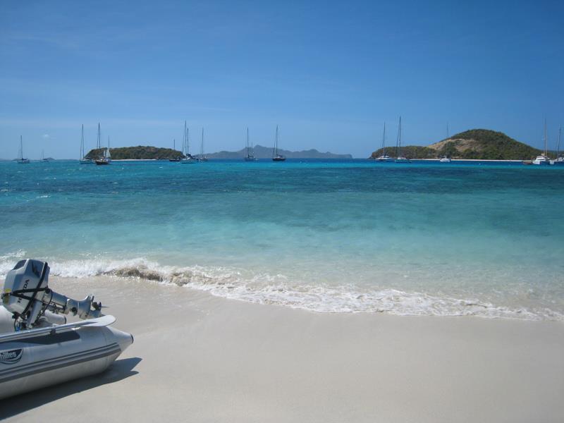 The water is a clear aqua and it's the most amazing place we've ever experienced. Petit Rameau and Petit Bateau have lovely beaches for swimming photo copyright Daria Blackwell taken at Ocean Cruising Club and featuring the Cruising Yacht class