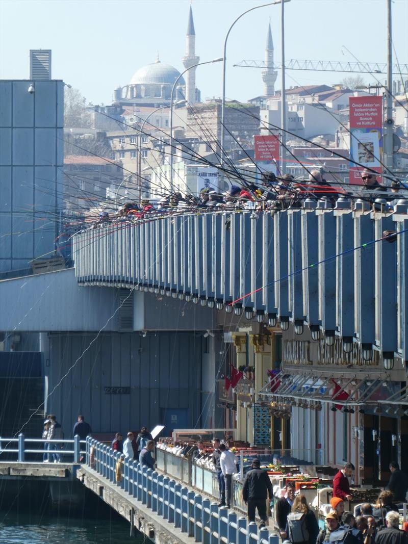 Fishing off the Bridge - Travelling Turkiye II – Istanbul photo copyright Red Roo taken at  and featuring the Cruising Yacht class